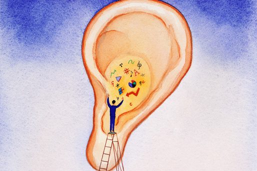 Conductor standing on ladder in front of ear, conducting symbols