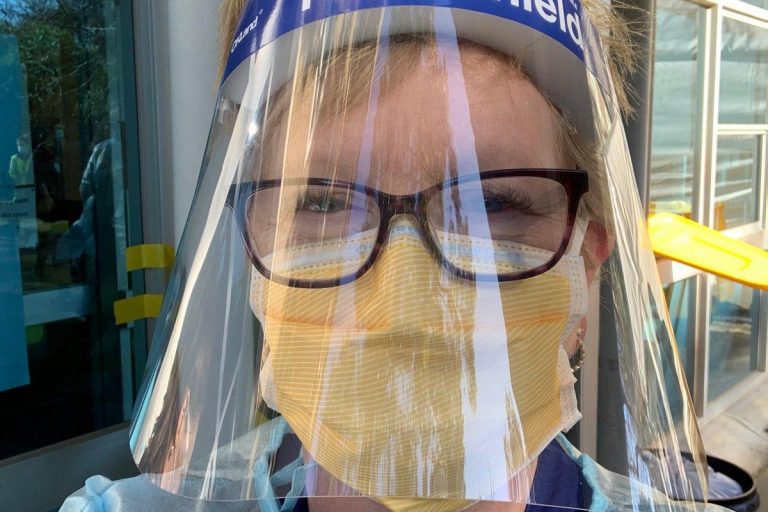 ‘i-would-do-it-again-in-a-heartbeat Lisa donned in full PPE while testing at the towers